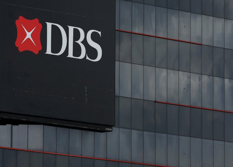© Reuters. A logo of DBS is pictured outside an office in Singapore