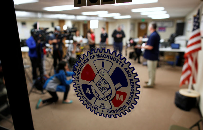 © Reuters. Evans speaks to the media at IAM headquarters in North Charleston