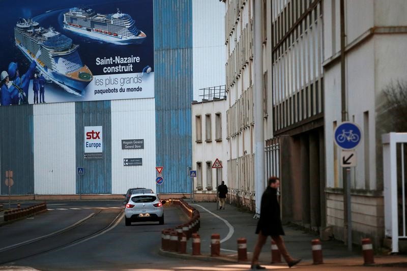 © Reuters. ROME JUGE "INACCEPTABLE" L'ATTITUDE DU GOUVERNEMENT FRANÇAIS VIS-À-VIS DE FINCANTIERI DANS LE DOSSIER STX