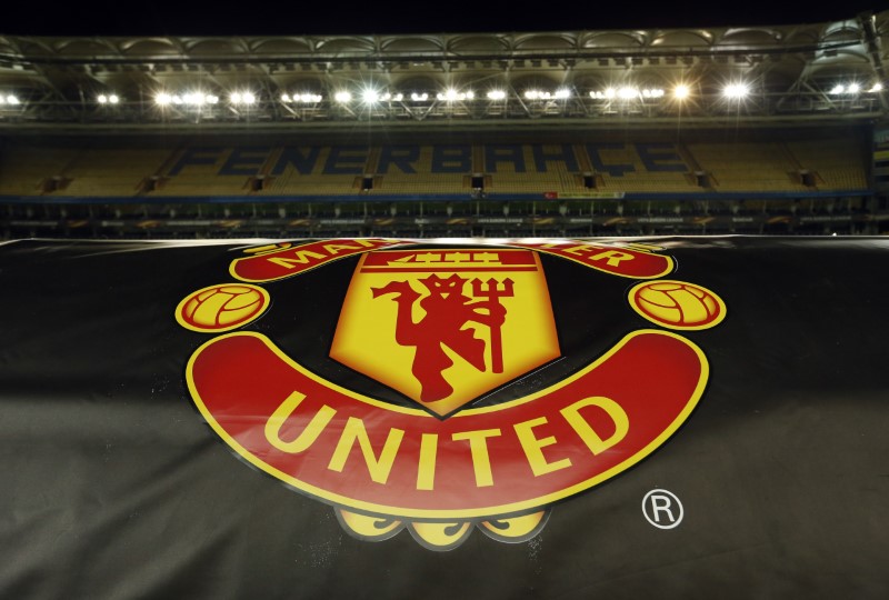 © Reuters. General view of the Manchester United emblem on display in the stadium after the press conference