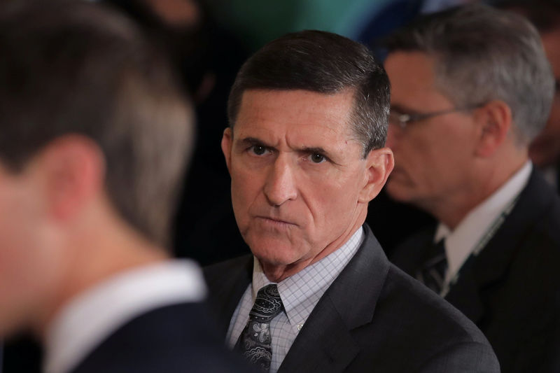 © Reuters. White House National Security Advisor Michael Flynn (C) arrives prior to a joint news conference between Canadian Prime Minister Justin Trudeau and U.S. President Donald Trump at the White House in Washington, U.S.