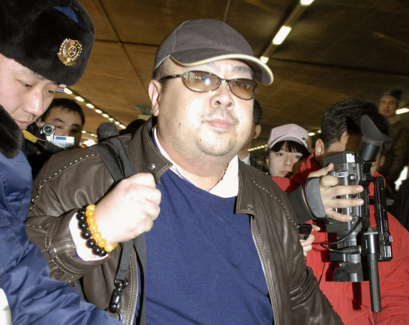 © Reuters. Kim Jong Nam arrives at Beijing airport in Beijing, China, in this photo taken by Kyodo