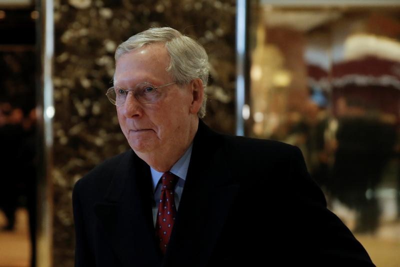 © Reuters. U.S. Senate Majority Leader Mitch McConnell stops to speak to members of the news media after meeting with U.S. President-elect Donald Trump at Trump Tower in New York