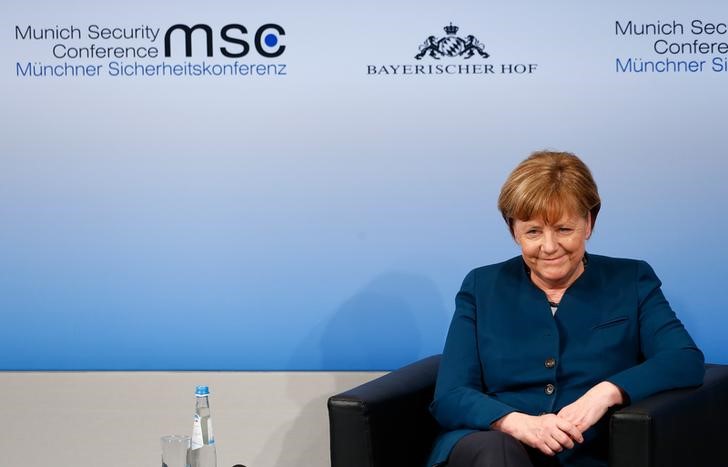 © Reuters. German Chancellor Merkel reacts after delivering her speech during the 53rd Munich Security Conference in Munich