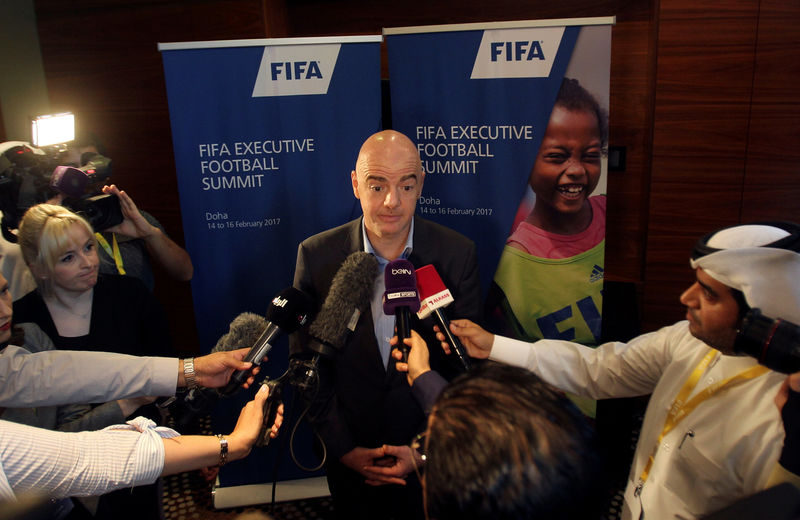 © Reuters. FIFA President Gianni Infantino speaks to the media in Doha