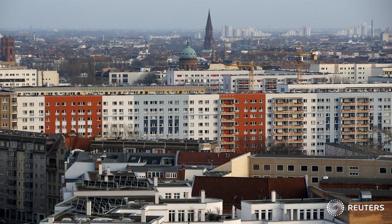 © Reuters. Apartment buildings with the Saint Michael church (C) are pictured at Berlin's Kreuzberg district