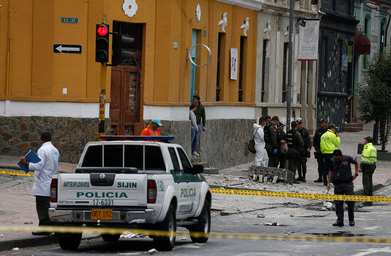 © Reuters. Police work the scene where an explosion occurred near Bogota's bullring