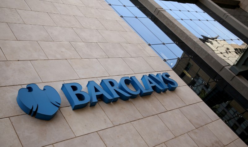 © Reuters. FILE PHOTO - A Barclays logo is pictured outside the Barclays towers in Johannesburg