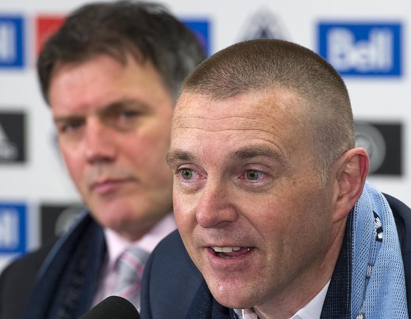 © Reuters. Vancouver Whitecaps FC CEO Paul Barber and President Bob Lenarduzzi attend a news conference in Vancouver