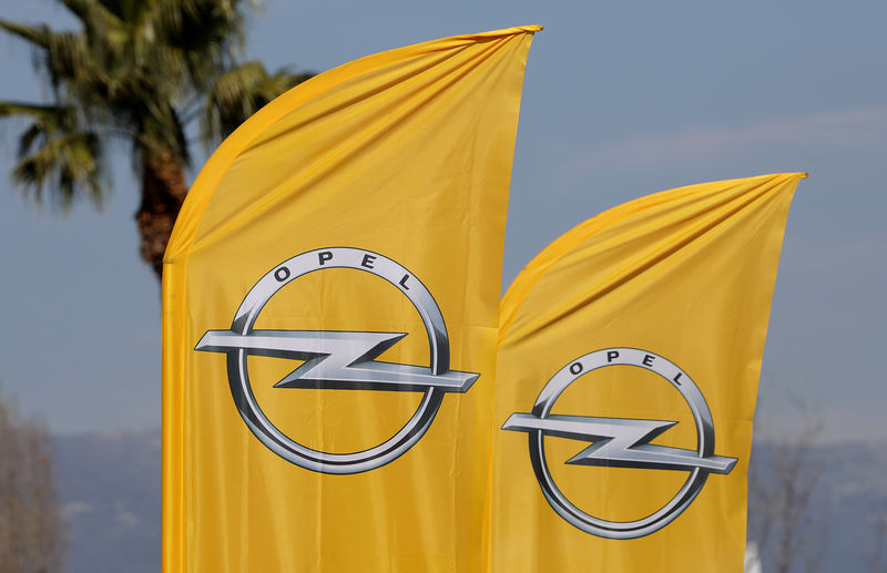 © Reuters. Logos of German car maker Opel are seen on banners at a dealership in Nice