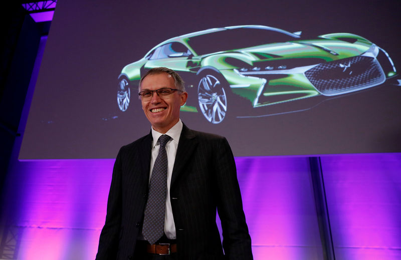 © Reuters. Carlos Tavares, Chairman of the Managing Board of French carmaker PSA Peugeot Citroen, arrives to attend a news conference to present the company's 2016 annual results at Peugeot headquarters in Paris