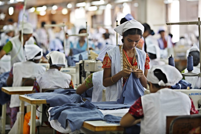 © Reuters. Joli Khatun works in a garment factory in Gazipur