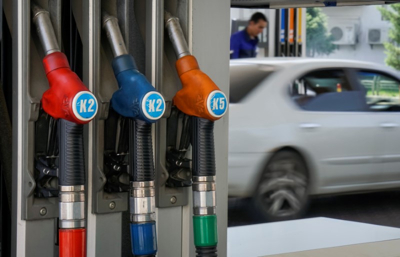 © Reuters. Fuel pump nozzles are pictured at Helios petrol station in Almaty