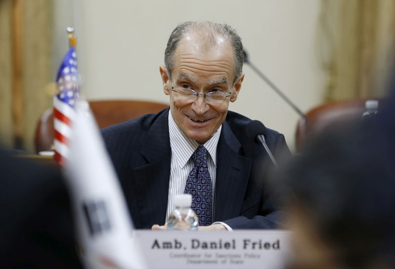 © Reuters. FILE PHOTO - Daniel Fried sits for the high-level sanctions meeting with Kim Hong-kyun at the Foreign Ministry in Seoul