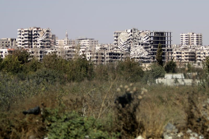 © Reuters. Un ataque contra las fuerzas de seguridad sirias en Homs deja 14 muertos