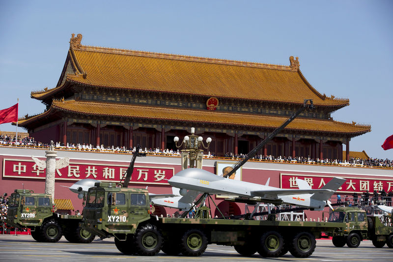 © Reuters. FILE PHOTO -  Military vehicles carrying Wing Loong, a Chinese-made medium altitude long endurance unmanned aerial vehicle, travel past Tiananmen Gate during a military parade to commemorate the 70th anniversary of the end of World War II in Beijing