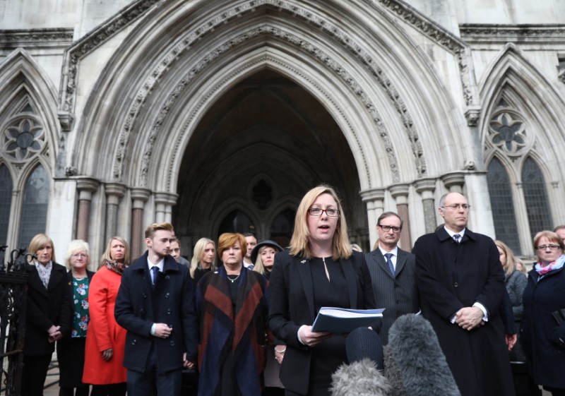 © Reuters. Solicitor Kylie Hutchinson speaks for friends and relatives of victims of the Tunisia terror attack as they leave an inquest at the Royal Courts of Justice in London