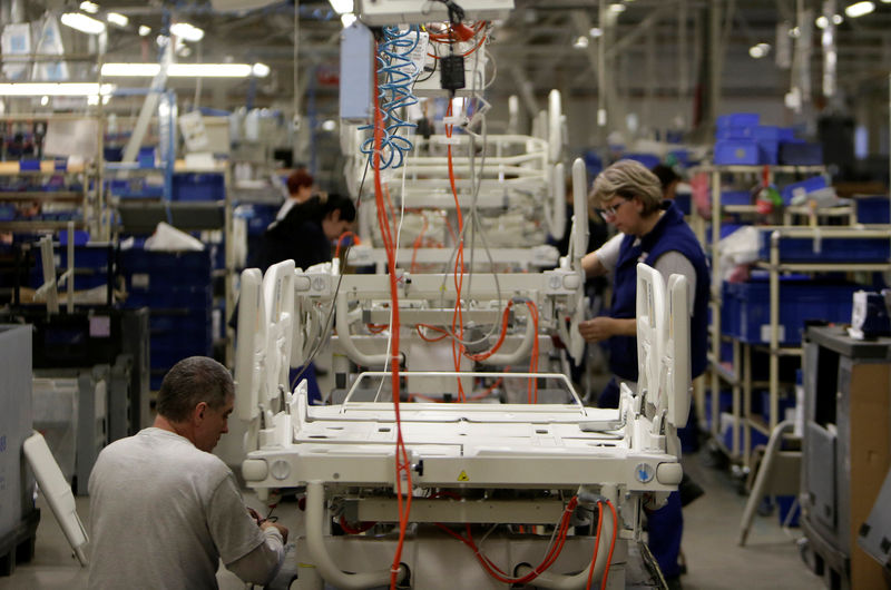 © Reuters. Workers assemble hospital beds in Linet factory in Slany