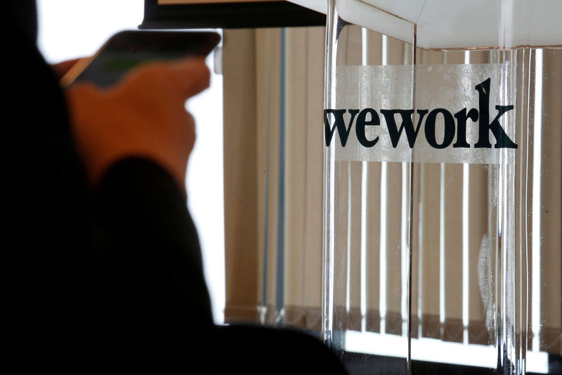 © Reuters. FILE PHOTO -  A guest attends the opening ceremony of WeWork Hong Kong flagship location in Hong Kong, China