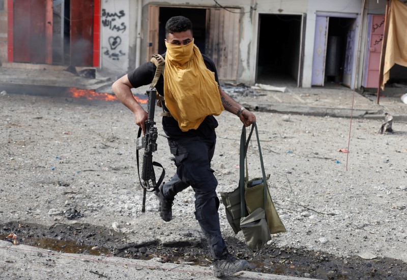 © Reuters. ضباط: القوات العراقية تصد هجوما مضادا للدولة الإسلامية بغرب الموصل