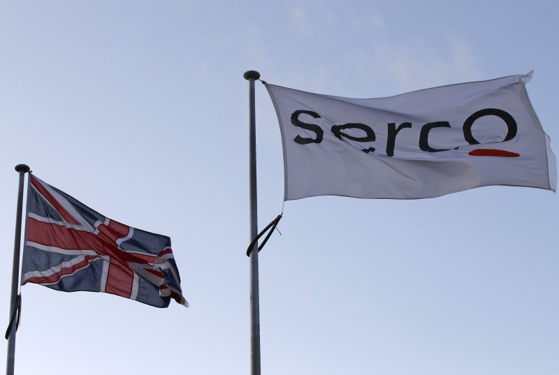 © Reuters. File photograph shows a Serco flag flying alongside a Union flag outside Doncaster Prison in northern England