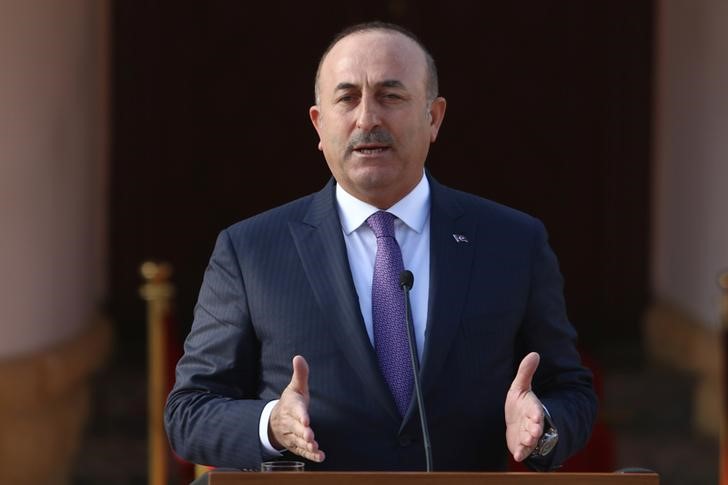 © Reuters. Turkey's Foreign Minister Mevlut Cavusoglu speaks to the media during a visit to northern Cyprus