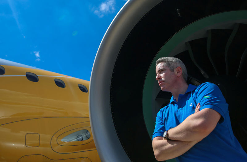 © Reuters. Embraer's commercial aviation chief Slattery poses for picture during the launch of the E195-E2 commercial jet's first prototype in Sao Jose dos Campos