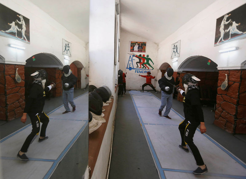 © Reuters. Afghan girls practise their daily training at a fencing club in Kabul, Afghanistan