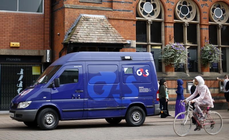 © Reuters. File photo of a G4S security van parked outside a bank in Loughborough