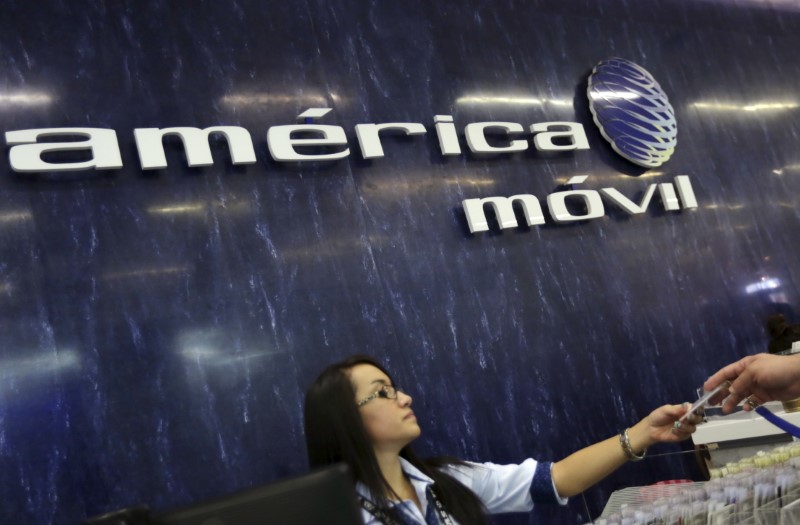 © Reuters. The America Movil logo is seen at the reception area in the company's offices in Mexico City