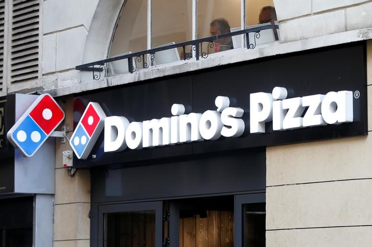 © Reuters. The sign of a Domino's Pizza restaurant is seen in Paris