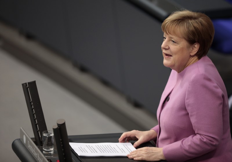 © Reuters. German Chancellor Merkel addresses the German lower house of parliament Bundestag in Berlin