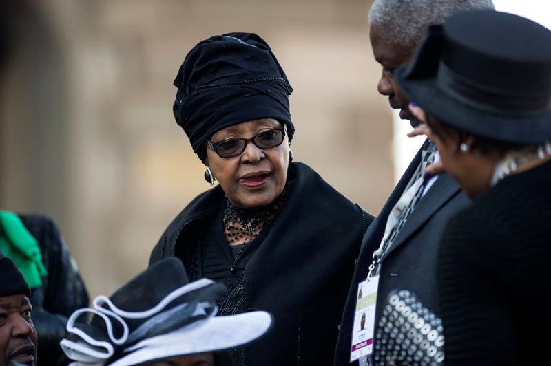 © Reuters. FILE PHOTO: Winnie Mandela attends the inauguration ceremony of South African President Jacob Zuma at the Union Buildings in Pretoria