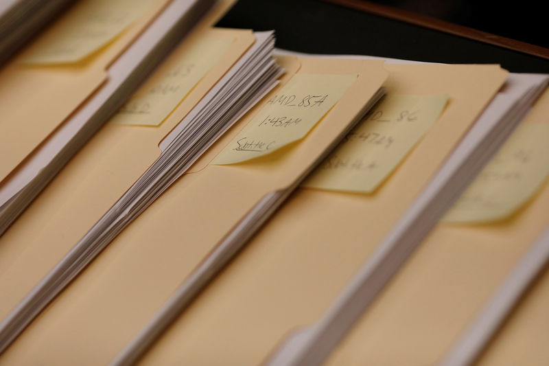 © Reuters. Copies of amendments offered during a marathon House Energy and Commerce Committee hearing on a potential replacement for the Affordable Care Act are seen on Capitol Hill