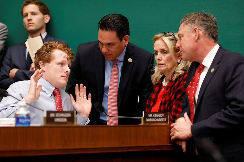 © Reuters. Rep. Joseph Kennedy (D-MA), Rep. Pete Aguilar (D-CA), Rep. Debbie Dingell (D-MI) and Rep. Scott Peters (D-CA) speak during a marathon House Energy and Commerce Committee hearing on a potential replacement for the Affordable Care Act