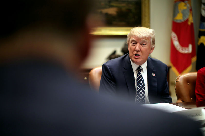 © Reuters. FILE PHOTO: U.S. President Donald Trump attends a listening session with CEOs of small and community banks at the White House in Washington