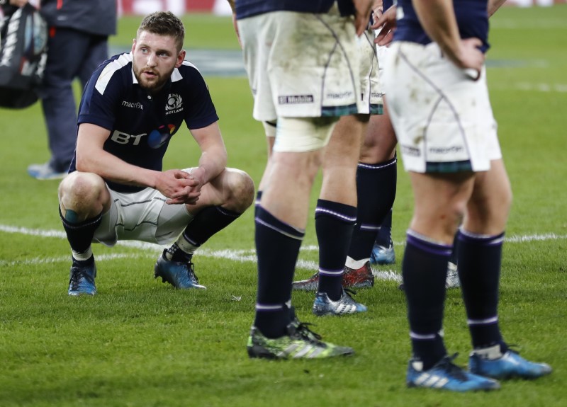 © Reuters. Scotland's Finn Russell looks dejected after the match