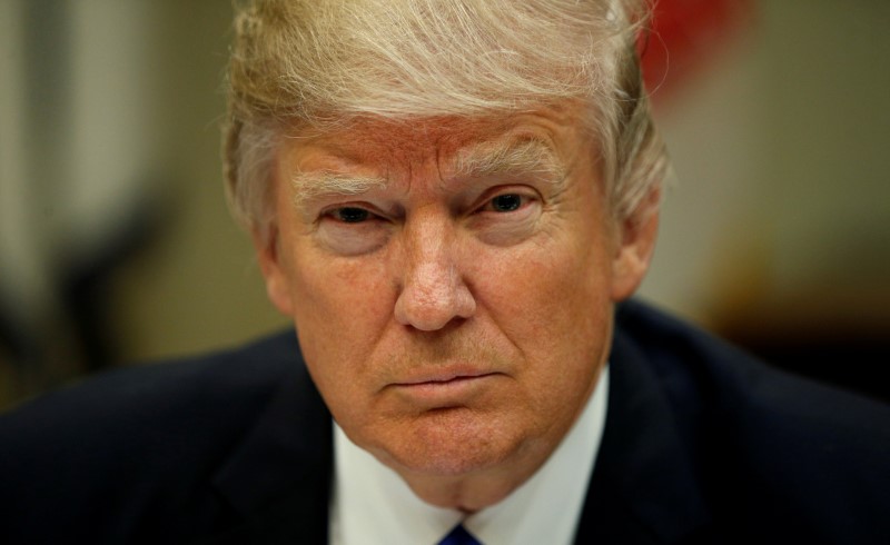 © Reuters. FILE PHOTO: U.S. President Donald Trump looks up while hosting a House and Senate leadership lunch at the White House in Washington