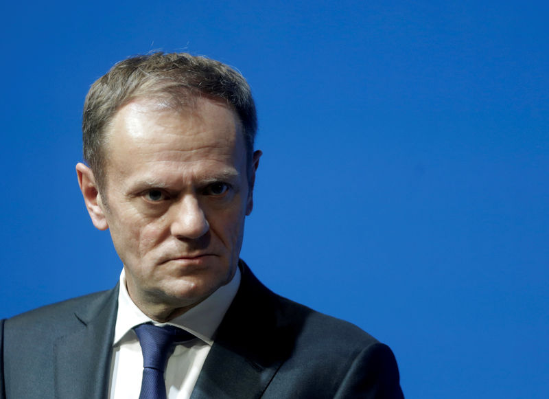 © Reuters. FILE PHOTO - President of the European Council Tusk listens during a news conference in Tallinn