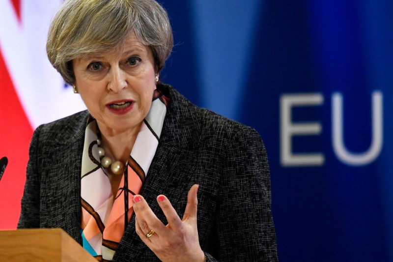 © Reuters. Britain's Prime Minister Theresa May attends a news conference during the EU Summit in Brussels