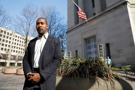 © Reuters. Smith, Legal Director of Muslim Advocates, stands in front of the U.S. Justice Department building in Washington