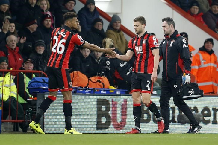 © Reuters. Bournemouth's Tyrone Mings comes on as a substitute to replace Simon Francis after he sustains an injury