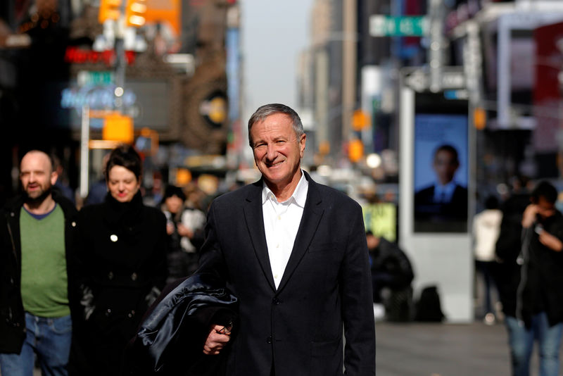 © Reuters. Peabody investor Joel Packer poses in Times Square in New York