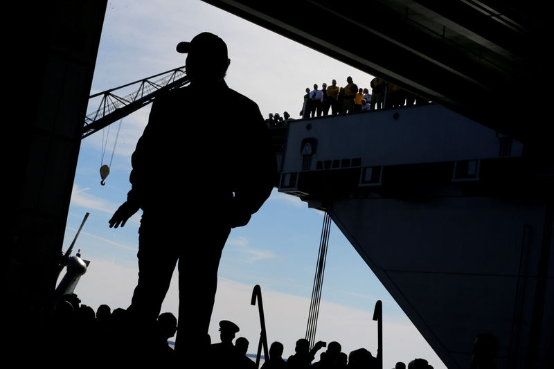 © Reuters. FILE PHOTO - Donald Trump delivers remarks aboard the pre-commissioned U.S. Navy aircraft carrier Gerald R. Ford in Newport News Virginia