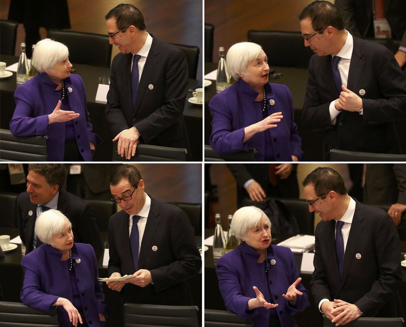 © Reuters. U.S. Treasury Secretary Steve Mnuchin speaks with Federal Reserve Chair Janet Yellen at the G20 Finance Ministers and Central Bank Governors Meeting in Baden-Baden