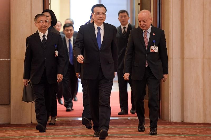© Reuters. Chinese Premier Li Keqiang meets Global 500 enterprises' heads at China Development Forum at Diaoyutai State Guesthouse on March 20, 2017 in Beijing, China