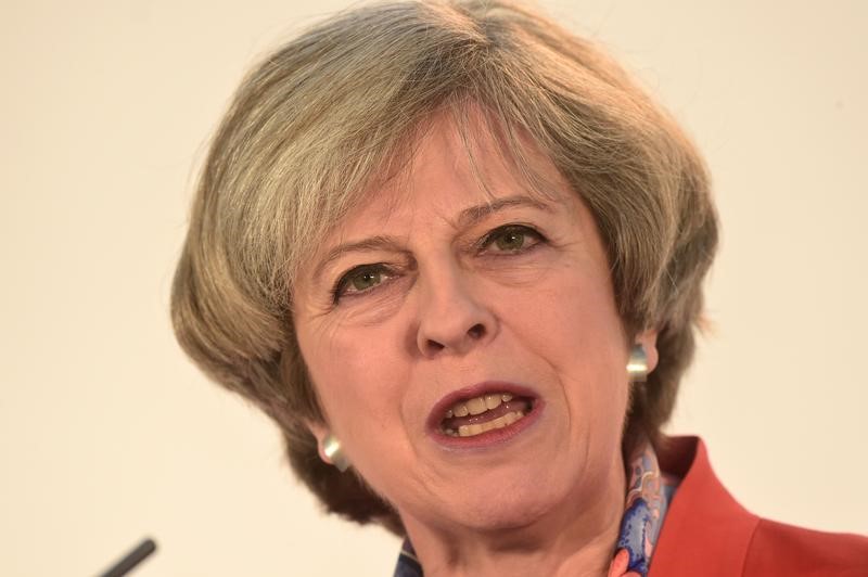 © Reuters. Britain's Prime Minister Theresa May speaks at the Conservative Party's Spring Forum in Cardiff, Wales