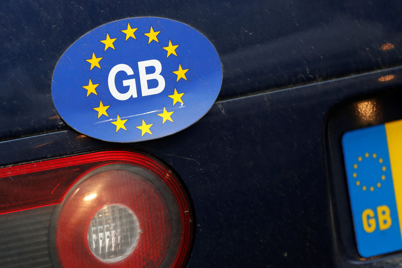 © Reuters. A sticker on a car is seen near the Houses of Parliament in London