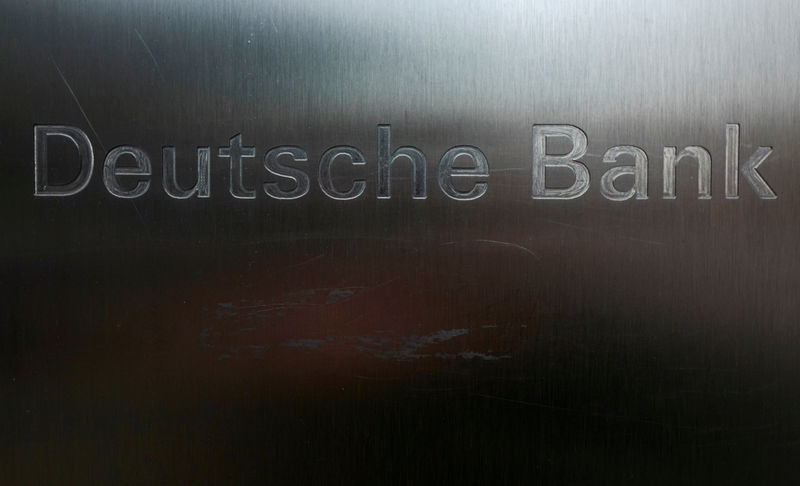 © Reuters. FILE PHOTO: Scratches are seen on the logo of Germany's Deutsche Bank in Frankfurt