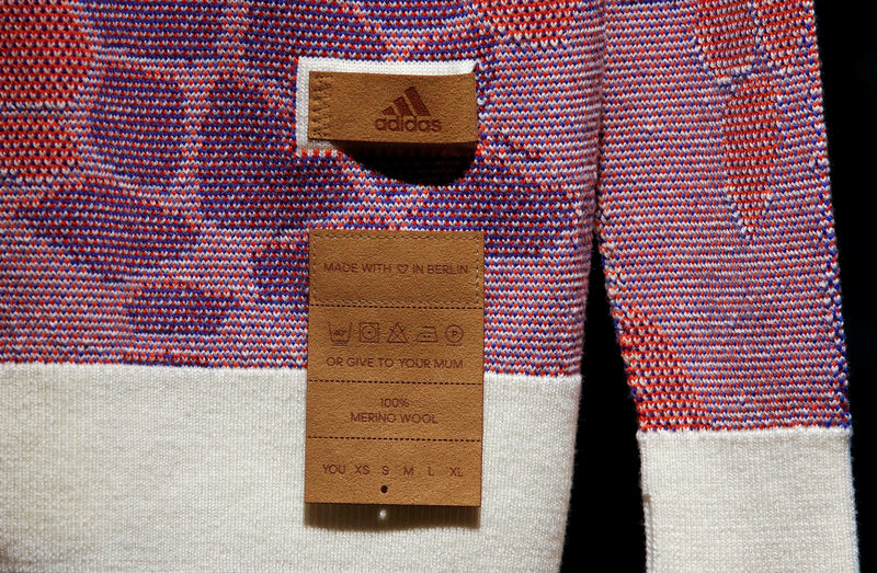 © Reuters. A label is pictured on a sweater at the Adidas Knit for You store in Berlin